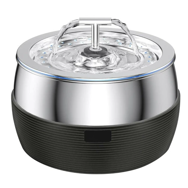 dog backpack harness being hosed down after beach hike